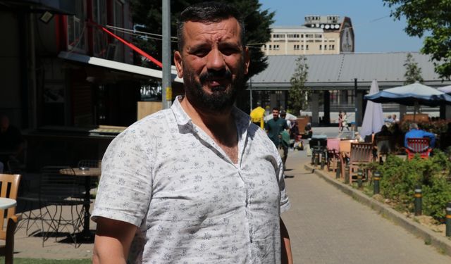 Bursa'da, polisten kaçan şüpheliyi esnaf yakaladı